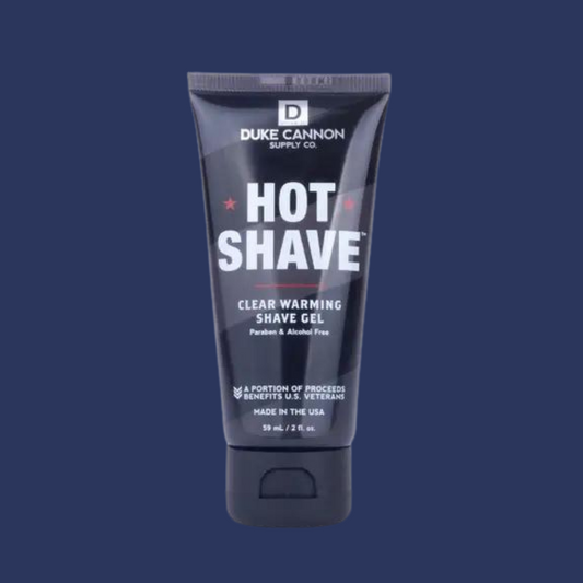 Tube of Duke Cannon's Hot Shave clear warming shaving gel with black and red labeling