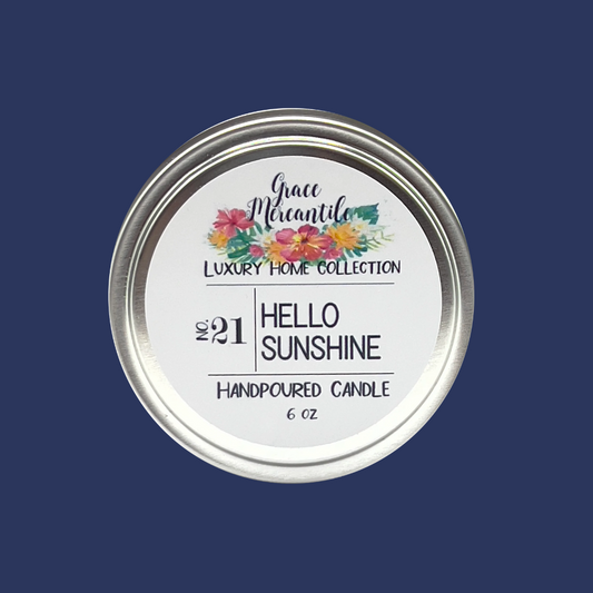 tin white can; grace mercantile hello sunshine hand-poured candle placed centrally on a navy background