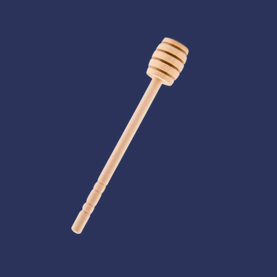 A wooden honeycomb stick used for drizzling honey, with a natural beige finish.