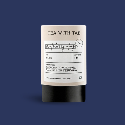 Tea package with label; TEA WITH TAE, Fruit & Berry flavor; on a blue background