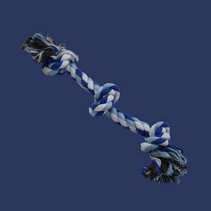 braided dog toy centrally placed on a navy background
