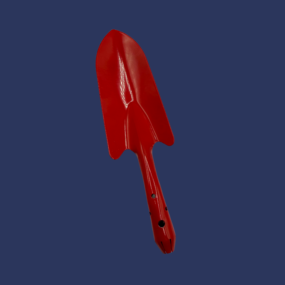 A red hand shovel with a smooth blade and a handle, against a blue background.