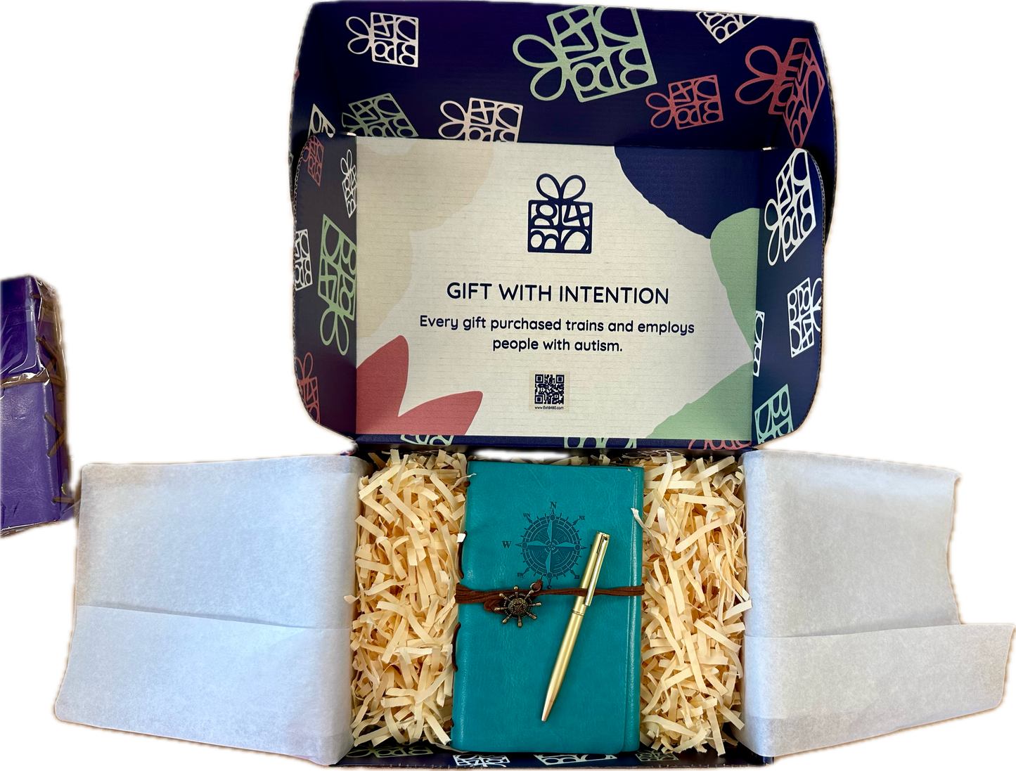 navy blue gift box with exit 8480's logo; with a journal and pen inside the packagaging