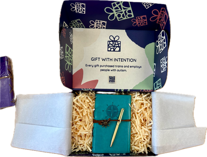 navy blue gift box with exit 8480's logo; with a journal and pen inside the packagaging