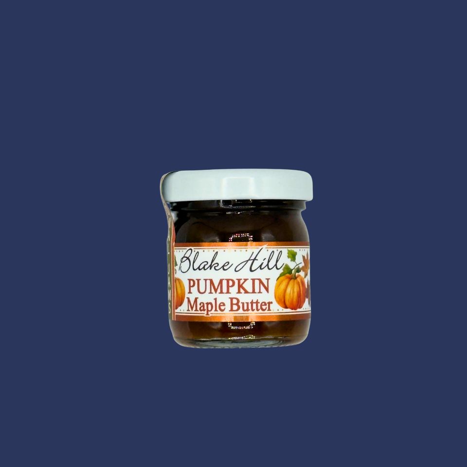 Jar of Blake Hill Pumpkin Maple Butter jam on a blue background