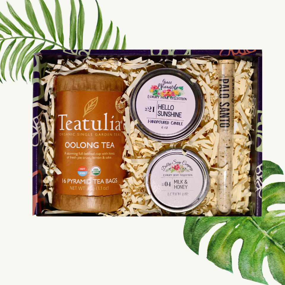 Teatulia Oolong Tea, with Hello Sunshine candle, Milk and Honey lotion bar, and bath salt; showcased in one of exit 8480's boxes