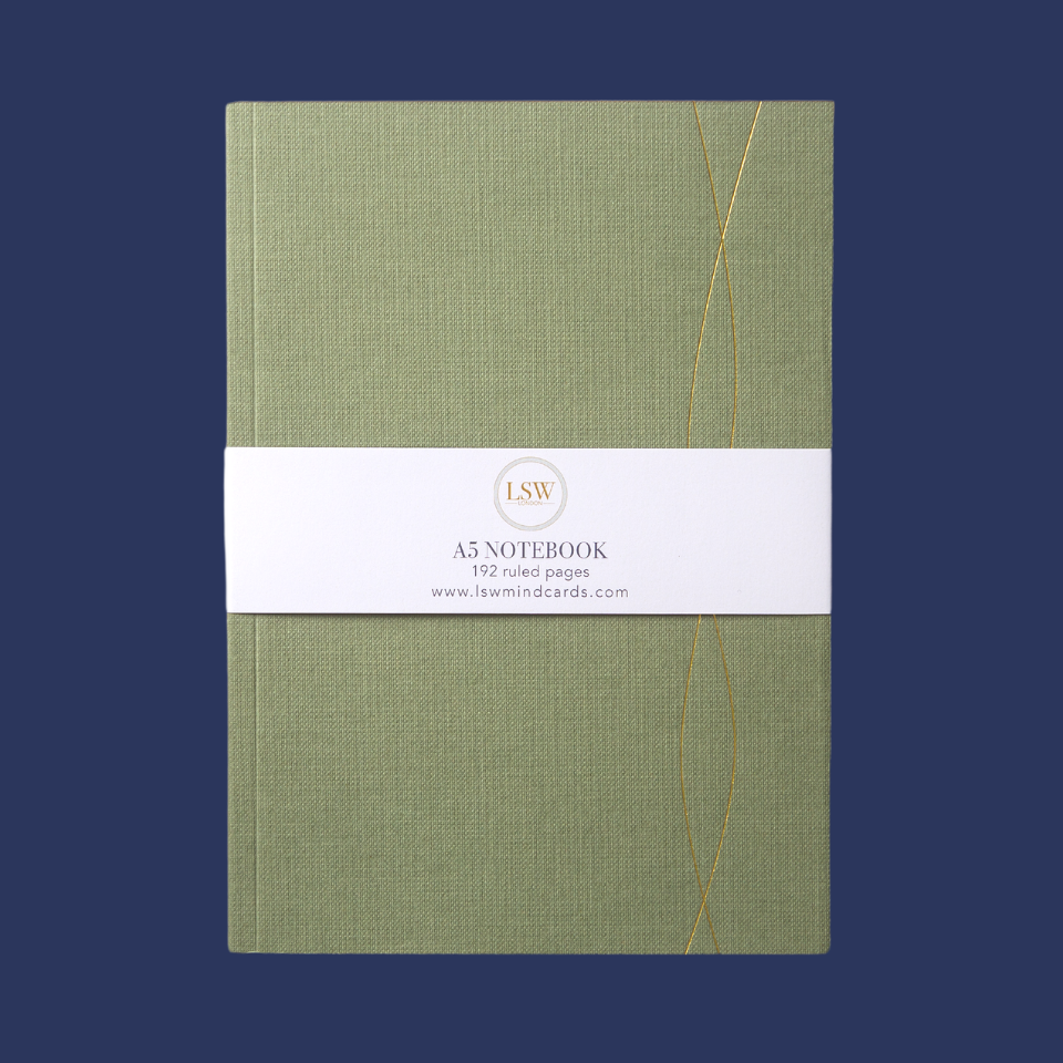 LSW London green notebook with gold debossed cover and white spine, centrally placed on a navy background.