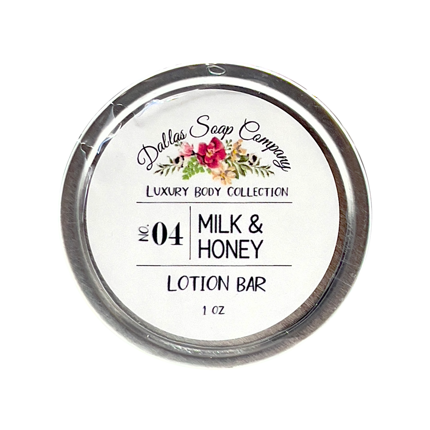 lotion bar with milk and honey scent; packaged in a circular tin can; show top down