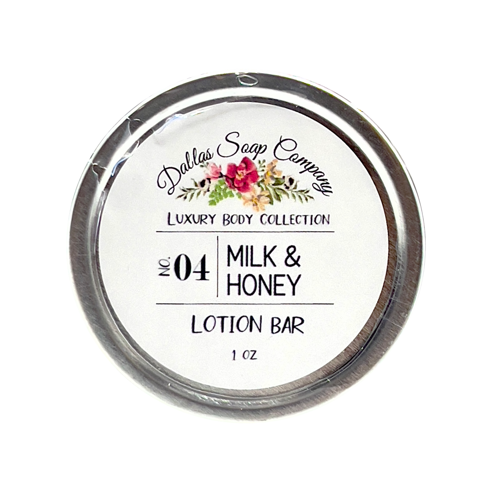 lotion bar with milk and honey scent; packaged in a circular tin can; show top down