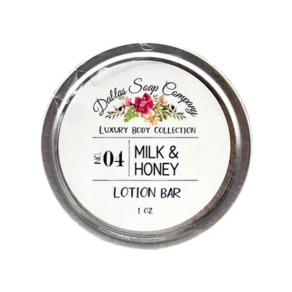 lotion bar with milk and honey scent; packaged in a circular tin can; show top down
