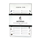 white notepad with clip art on the sides